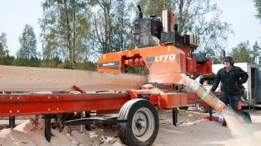 Učenje obdelave lesa pri Wood-Mizerju na Švedskem
